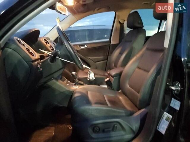 Чорний Фольксваген Тігуан, об'ємом двигуна 1.98 л та пробігом 105 тис. км за 1000 $, фото 6 на Automoto.ua