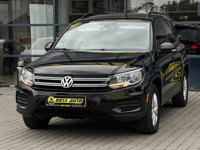 Чорний Фольксваген Тігуан, об'ємом двигуна 2 л та пробігом 176 тис. км за 14500 $, фото 2 на Automoto.ua