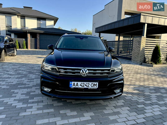 Черный Фольксваген Тигуан, объемом двигателя 2 л и пробегом 232 тыс. км за 26800 $, фото 1 на Automoto.ua