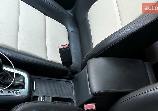 Чорний Фольксваген Тігуан, об'ємом двигуна 1.98 л та пробігом 230 тис. км за 10500 $, фото 1 на Automoto.ua