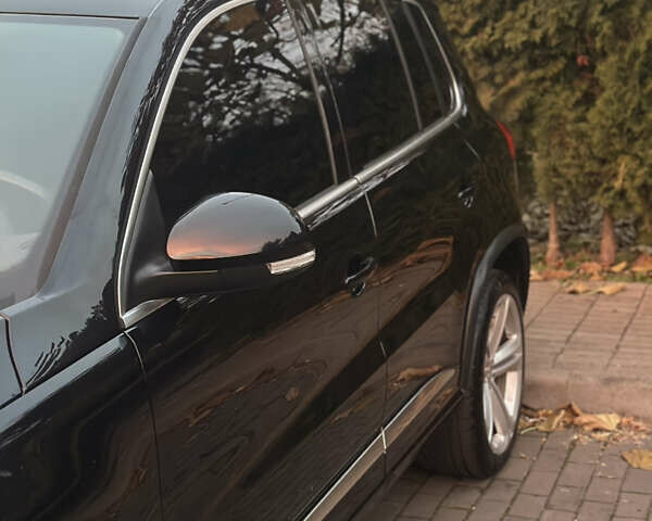 Чорний Фольксваген Тігуан, об'ємом двигуна 2 л та пробігом 207 тис. км за 14200 $, фото 3 на Automoto.ua