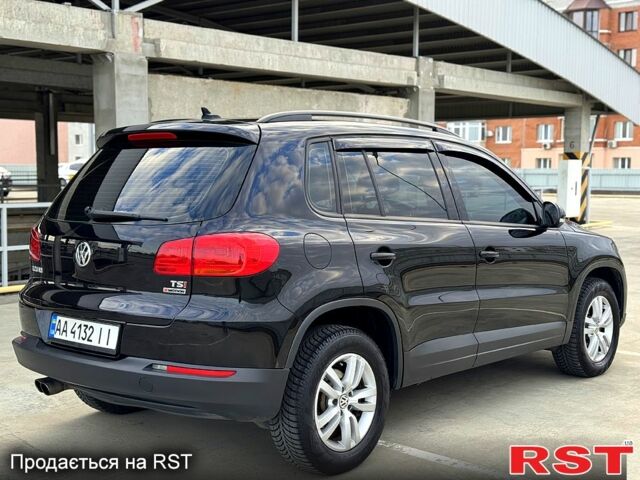 Чорний Фольксваген Тігуан, об'ємом двигуна 2 л та пробігом 184 тис. км за 12450 $, фото 6 на Automoto.ua