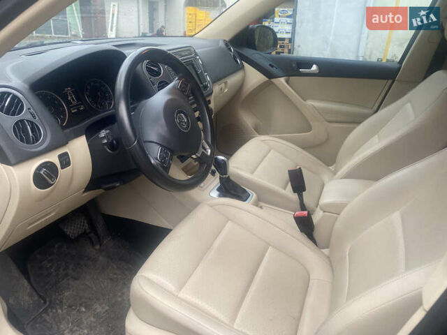 Черный Фольксваген Тигуан, объемом двигателя 1.98 л и пробегом 130 тыс. км за 12499 $, фото 2 на Automoto.ua