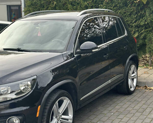 Чорний Фольксваген Тігуан, об'ємом двигуна 2 л та пробігом 207 тис. км за 14200 $, фото 4 на Automoto.ua