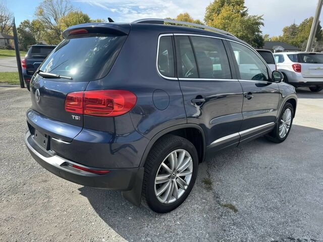 Чорний Фольксваген Тігуан, об'ємом двигуна 2 л та пробігом 80 тис. км за 5800 $, фото 4 на Automoto.ua