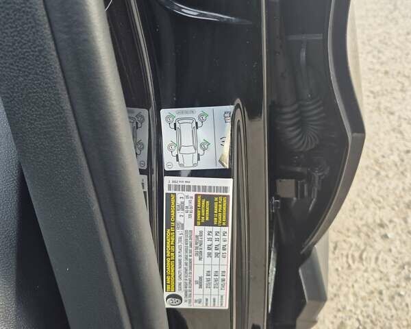 Чорний Фольксваген Тігуан, об'ємом двигуна 2 л та пробігом 135 тис. км за 13850 $, фото 4 на Automoto.ua