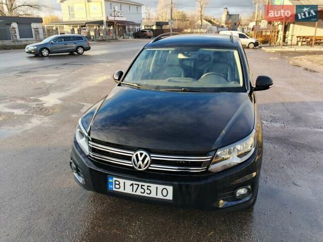 Черный Фольксваген Тигуан, объемом двигателя 1.98 л и пробегом 83 тыс. км за 12800 $, фото 1 на Automoto.ua