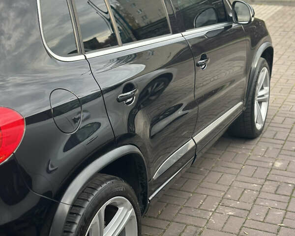 Чорний Фольксваген Тігуан, об'ємом двигуна 2 л та пробігом 207 тис. км за 14200 $, фото 7 на Automoto.ua