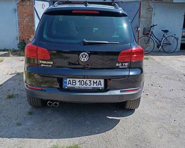 Черный Фольксваген Тигуан, объемом двигателя 1.98 л и пробегом 156 тыс. км за 16000 $, фото 1 на Automoto.ua