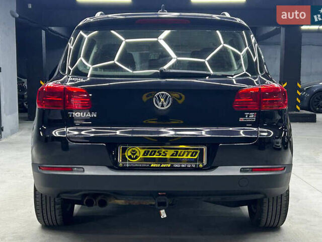 Черный Фольксваген Тигуан, объемом двигателя 2 л и пробегом 133 тыс. км за 14400 $, фото 4 на Automoto.ua