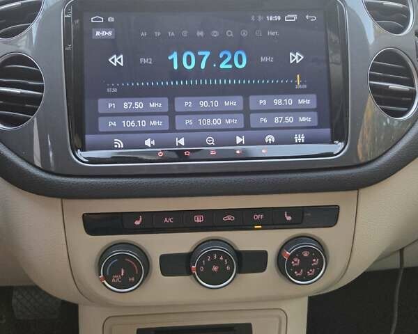 Черный Фольксваген Тигуан, объемом двигателя 1.98 л и пробегом 117 тыс. км за 14500 $, фото 10 на Automoto.ua