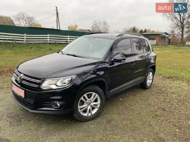 Чорний Фольксваген Тігуан, об'ємом двигуна 1.98 л та пробігом 124 тис. км за 13600 $, фото 15 на Automoto.ua
