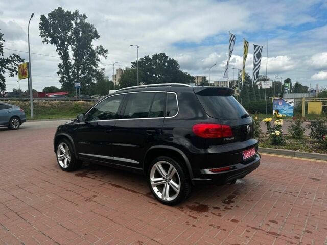 Чорний Фольксваген Тігуан, об'ємом двигуна 2 л та пробігом 220 тис. км за 14000 $, фото 3 на Automoto.ua