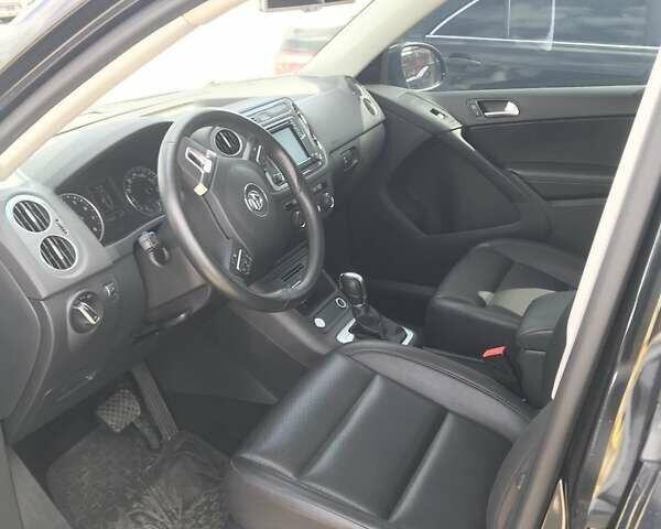 Черный Фольксваген Тигуан, объемом двигателя 1.98 л и пробегом 85 тыс. км за 14000 $, фото 4 на Automoto.ua