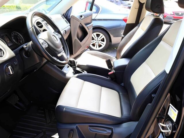 Черный Фольксваген Тигуан, объемом двигателя 2 л и пробегом 77 тыс. км за 5600 $, фото 5 на Automoto.ua