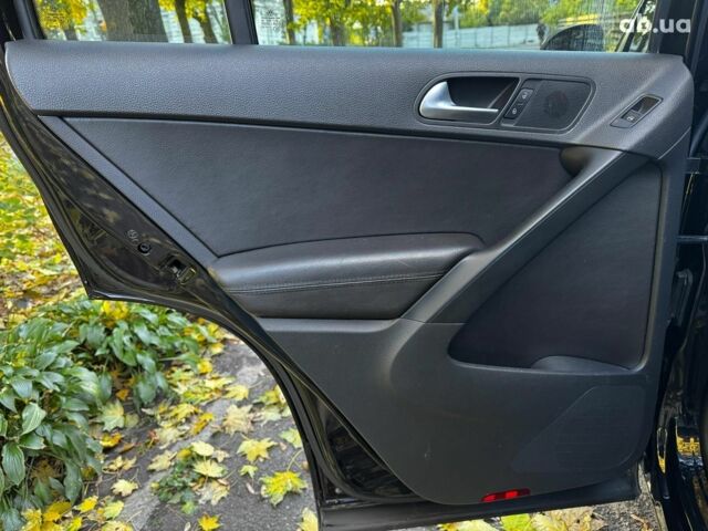 Черный Фольксваген Тигуан, объемом двигателя 2 л и пробегом 260 тыс. км за 12990 $, фото 26 на Automoto.ua