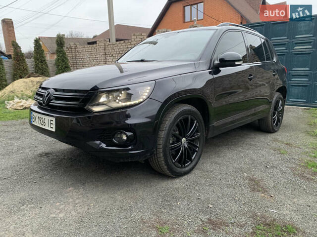 Черный Фольксваген Тигуан, объемом двигателя 2 л и пробегом 148 тыс. км за 13500 $, фото 1 на Automoto.ua