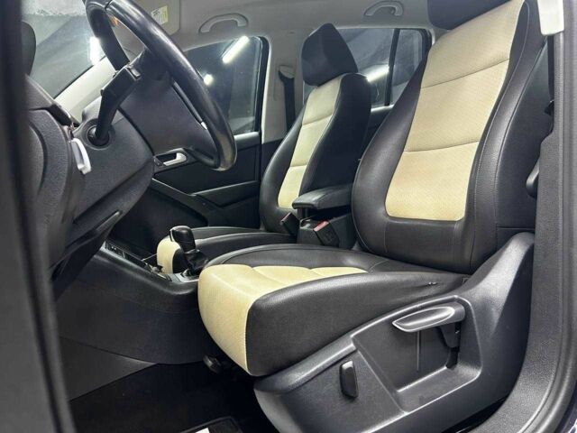 Чорний Фольксваген Тігуан, об'ємом двигуна 2 л та пробігом 133 тис. км за 14400 $, фото 6 на Automoto.ua