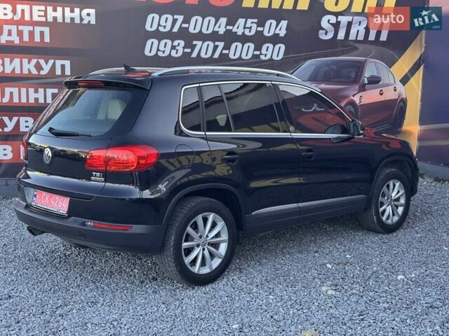 Чорний Фольксваген Тігуан, об'ємом двигуна 1.98 л та пробігом 155 тис. км за 13500 $, фото 6 на Automoto.ua