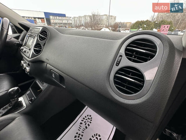 Чорний Фольксваген Тігуан, об'ємом двигуна 1.98 л та пробігом 160 тис. км за 13950 $, фото 101 на Automoto.ua