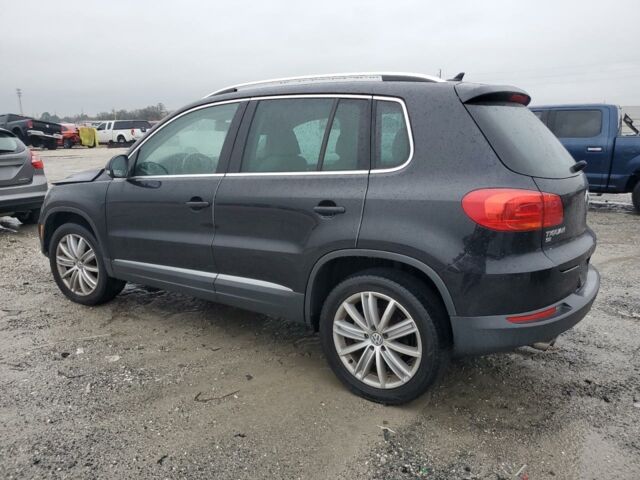 Черный Фольксваген Тигуан, объемом двигателя 2 л и пробегом 125 тыс. км за 8900 $, фото 3 на Automoto.ua