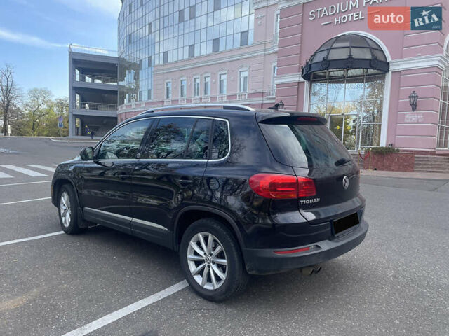 Чорний Фольксваген Тігуан, об'ємом двигуна 2 л та пробігом 180 тис. км за 14700 $, фото 4 на Automoto.ua