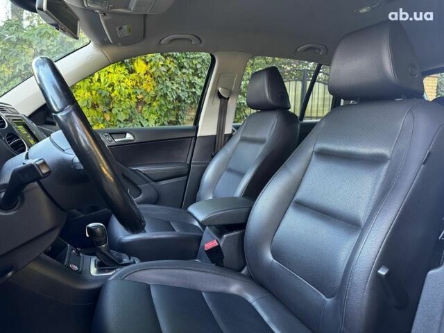 Черный Фольксваген Тигуан, объемом двигателя 2 л и пробегом 260 тыс. км за 12990 $, фото 25 на Automoto.ua