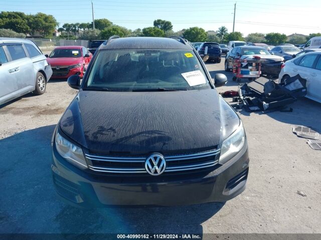 Черный Фольксваген Тигуан, объемом двигателя 2 л и пробегом 166 тыс. км за 9300 $, фото 1 на Automoto.ua