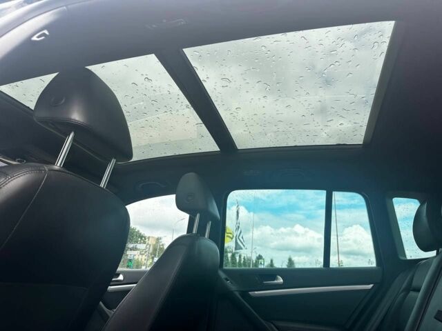 Чорний Фольксваген Тігуан, об'ємом двигуна 2 л та пробігом 220 тис. км за 14000 $, фото 12 на Automoto.ua