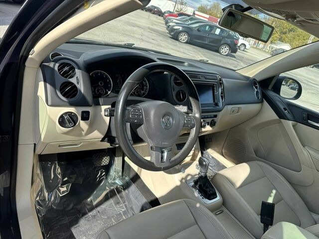 Чорний Фольксваген Тігуан, об'ємом двигуна 2 л та пробігом 80 тис. км за 5800 $, фото 9 на Automoto.ua