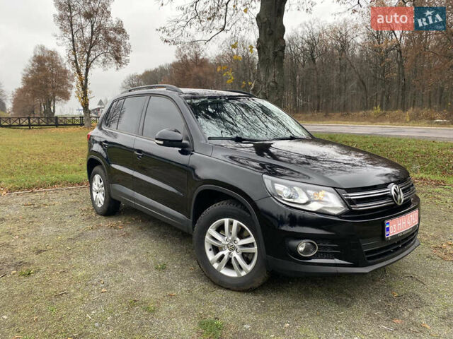 Чорний Фольксваген Тігуан, об'ємом двигуна 1.98 л та пробігом 124 тис. км за 13600 $, фото 9 на Automoto.ua
