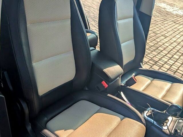 Чорний Фольксваген Тігуан, об'ємом двигуна 2 л та пробігом 139 тис. км за 13200 $, фото 6 на Automoto.ua