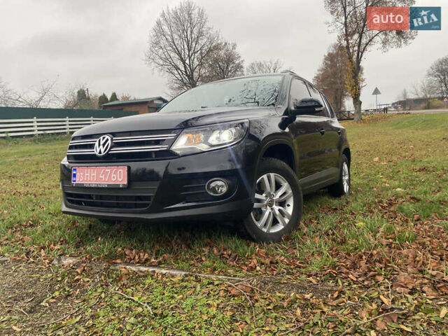 Чорний Фольксваген Тігуан, об'ємом двигуна 1.98 л та пробігом 124 тис. км за 13600 $, фото 2 на Automoto.ua