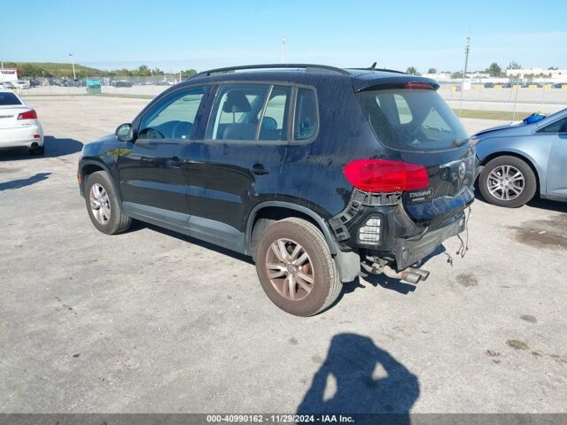 Черный Фольксваген Тигуан, объемом двигателя 2 л и пробегом 166 тыс. км за 9300 $, фото 3 на Automoto.ua