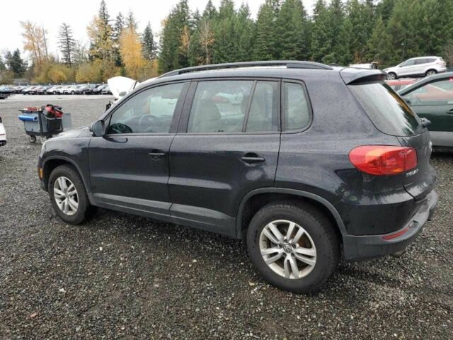 Черный Фольксваген Тигуан, объемом двигателя 2 л и пробегом 97 тыс. км за 2300 $, фото 1 на Automoto.ua