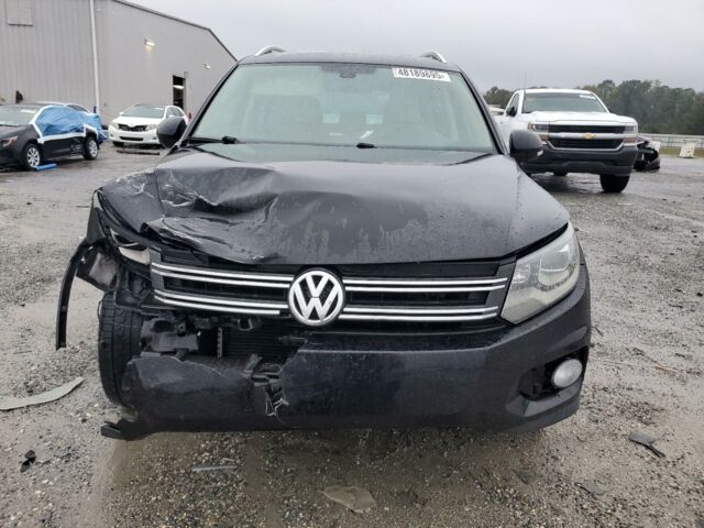 Черный Фольксваген Тигуан, объемом двигателя 2 л и пробегом 125 тыс. км за 8900 $, фото 1 на Automoto.ua