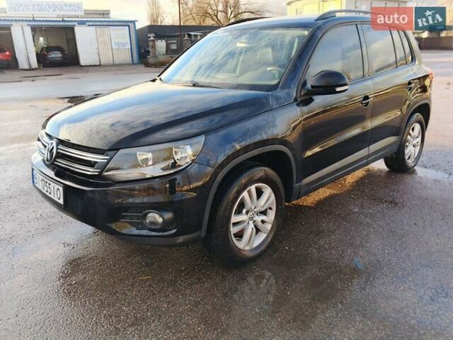 Черный Фольксваген Тигуан, объемом двигателя 1.98 л и пробегом 83 тыс. км за 12800 $, фото 2 на Automoto.ua
