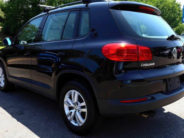 Черный Фольксваген Тигуан, объемом двигателя 2 л и пробегом 77 тыс. км за 5600 $, фото 4 на Automoto.ua