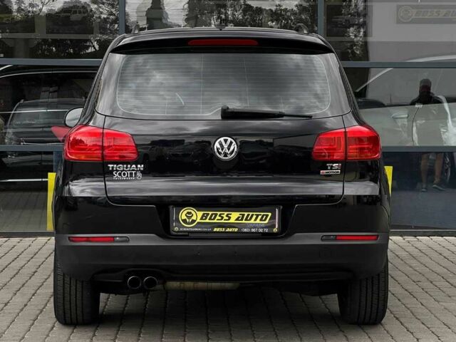 Чорний Фольксваген Тігуан, об'ємом двигуна 2 л та пробігом 176 тис. км за 14500 $, фото 4 на Automoto.ua