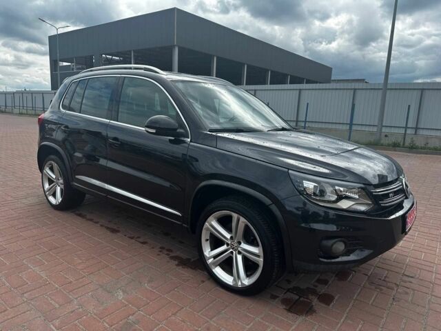 Чорний Фольксваген Тігуан, об'ємом двигуна 2 л та пробігом 220 тис. км за 14000 $, фото 2 на Automoto.ua