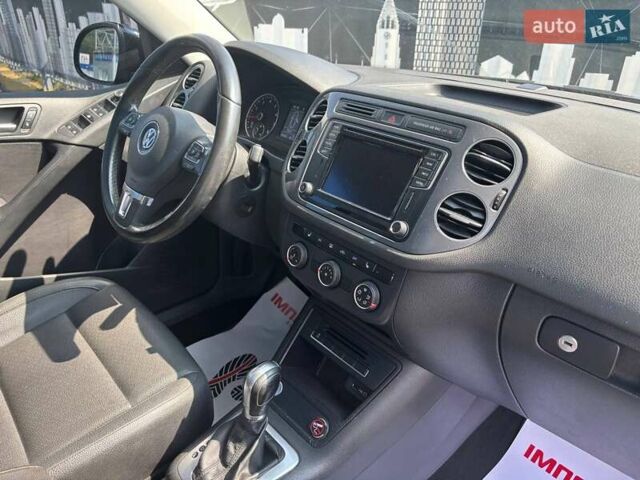 Чорний Фольксваген Тігуан, об'ємом двигуна 1.98 л та пробігом 180 тис. км за 14500 $, фото 8 на Automoto.ua