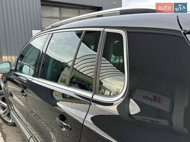 Чорний Фольксваген Тігуан, об'ємом двигуна 1.98 л та пробігом 160 тис. км за 13950 $, фото 31 на Automoto.ua