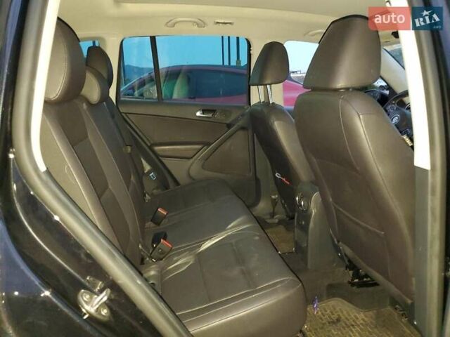 Чорний Фольксваген Тігуан, об'ємом двигуна 1.98 л та пробігом 105 тис. км за 1000 $, фото 9 на Automoto.ua