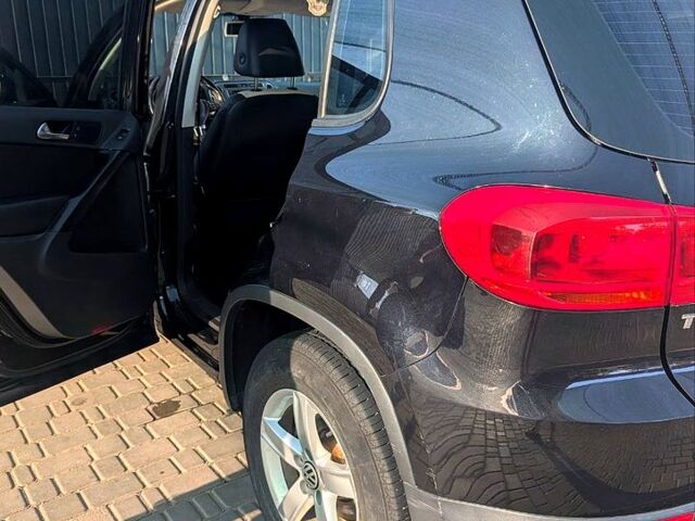 Чорний Фольксваген Тігуан, об'ємом двигуна 2 л та пробігом 139 тис. км за 13200 $, фото 3 на Automoto.ua