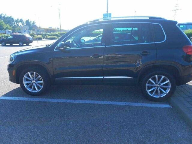 Черный Фольксваген Тигуан, объемом двигателя 2 л и пробегом 70 тыс. км за 9000 $, фото 3 на Automoto.ua