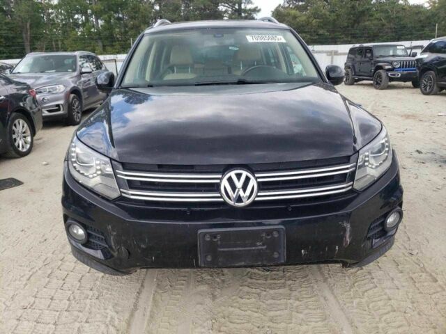 Чорний Фольксваген Тігуан, об'ємом двигуна 2 л та пробігом 64 тис. км за 1200 $, фото 4 на Automoto.ua