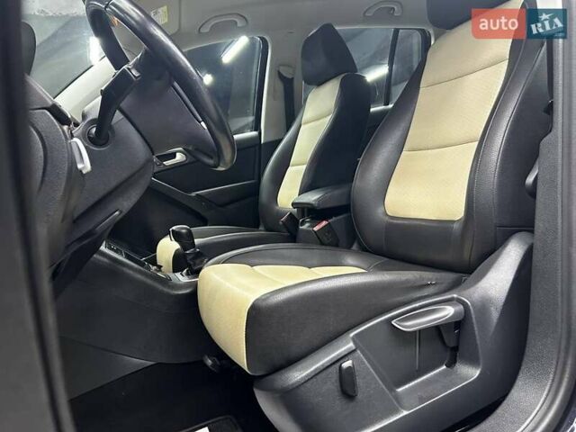 Черный Фольксваген Тигуан, объемом двигателя 2 л и пробегом 133 тыс. км за 14400 $, фото 7 на Automoto.ua