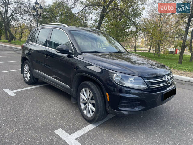 Чорний Фольксваген Тігуан, об'ємом двигуна 2 л та пробігом 180 тис. км за 14700 $, фото 1 на Automoto.ua