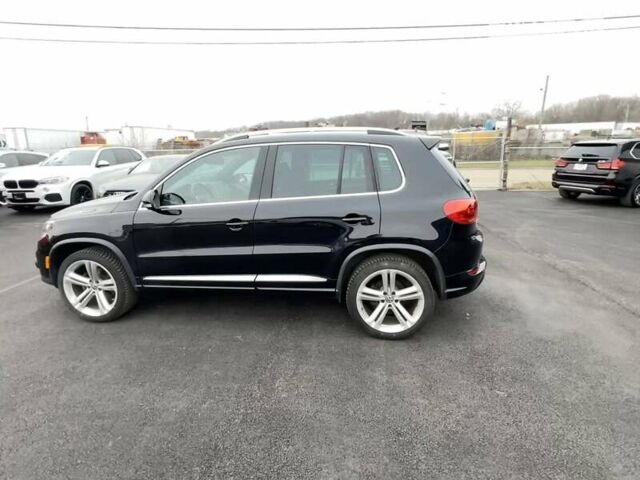 Черный Фольксваген Тигуан, объемом двигателя 2 л и пробегом 94 тыс. км за 2900 $, фото 1 на Automoto.ua