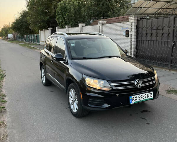 Черный Фольксваген Тигуан, объемом двигателя 1.98 л и пробегом 73 тыс. км за 16000 $, фото 1 на Automoto.ua